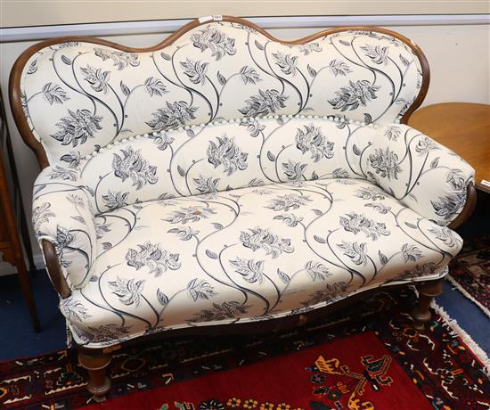 A 19th century Continental mahogany settee, W.144cm